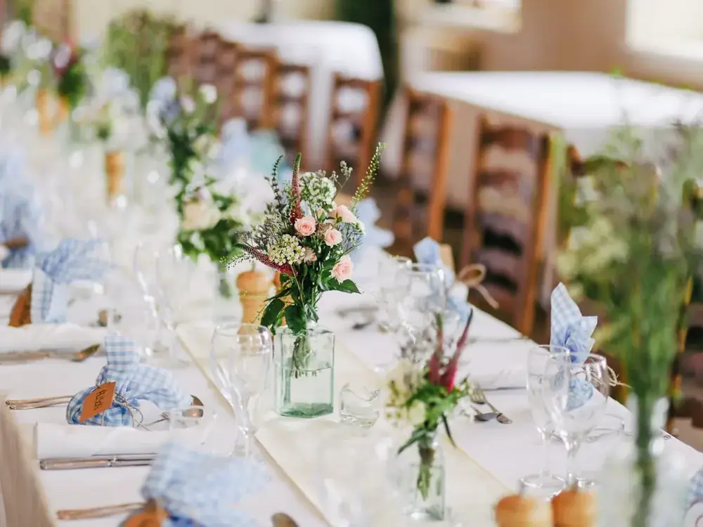 A set reception table with candles and flowers