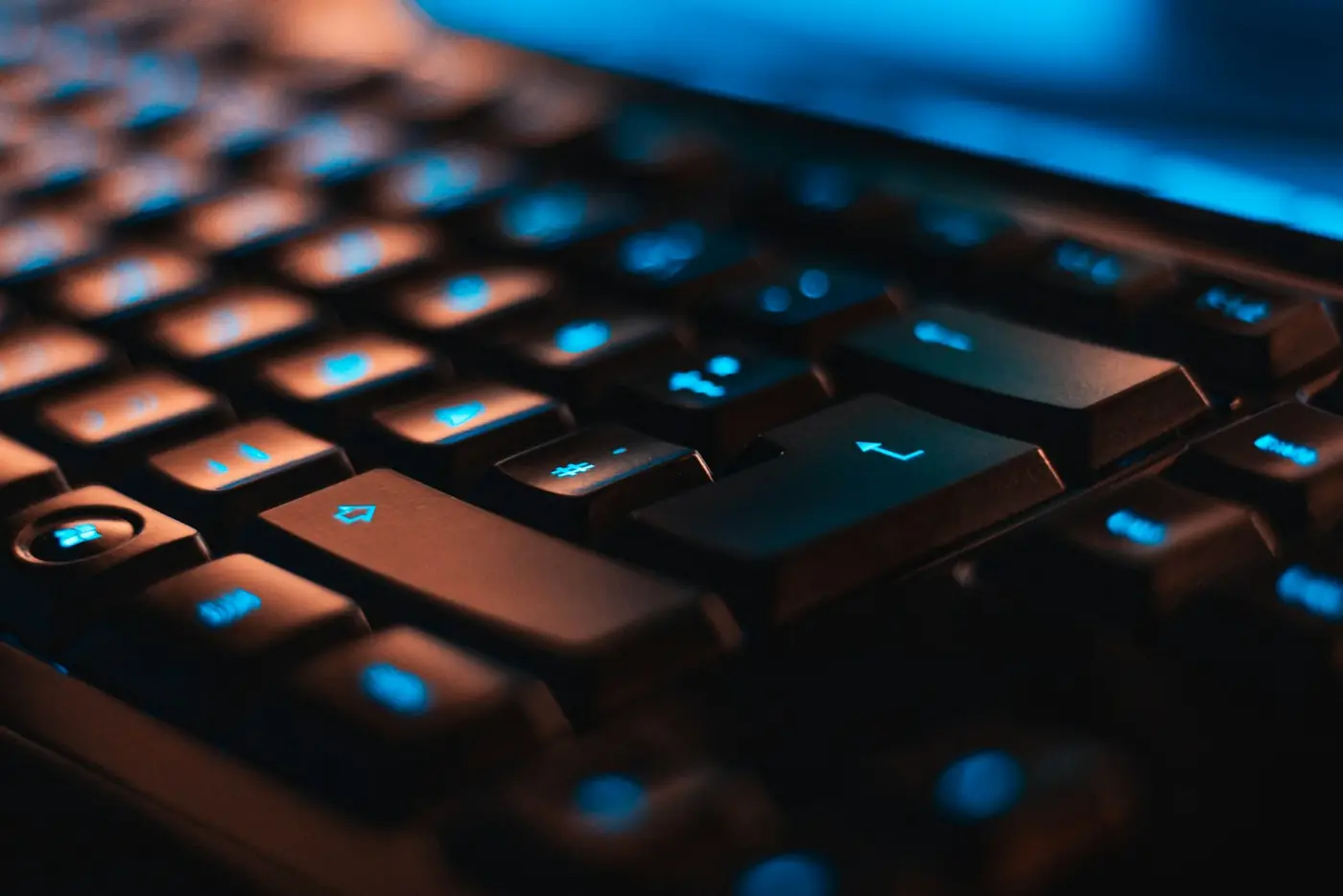 A backlit keyboard in a dark room